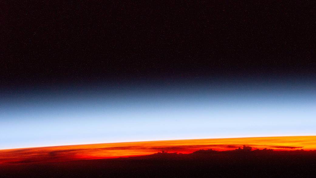 First rays of an orbital sunrise